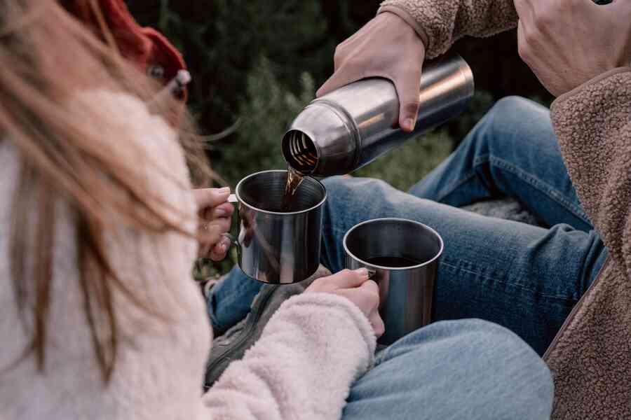 Friends sharing a hot drink