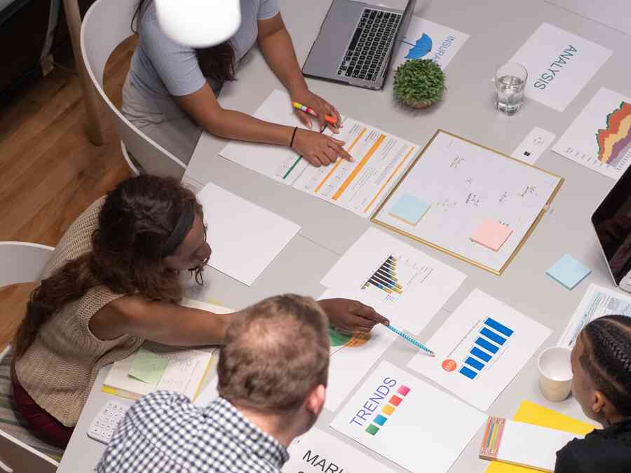 Co-workers sharing ideas around a table