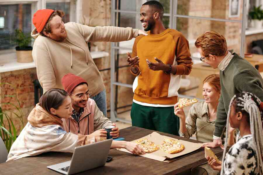 Friends having fun together around a table