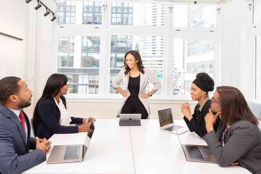 A woman leading a business meeting