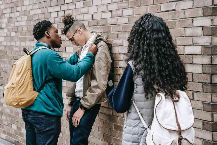 Man protecting a woman