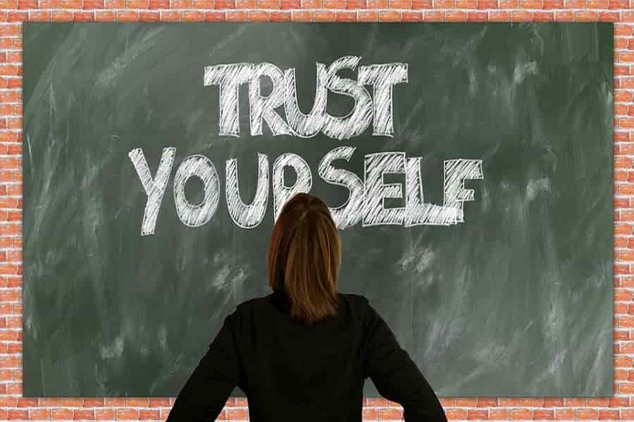 Woman looking at motivation sign